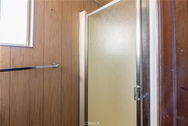4899 Glenwood Dr, Riverside, CA 92501 - full bath featuring a shower stall and wooden walls