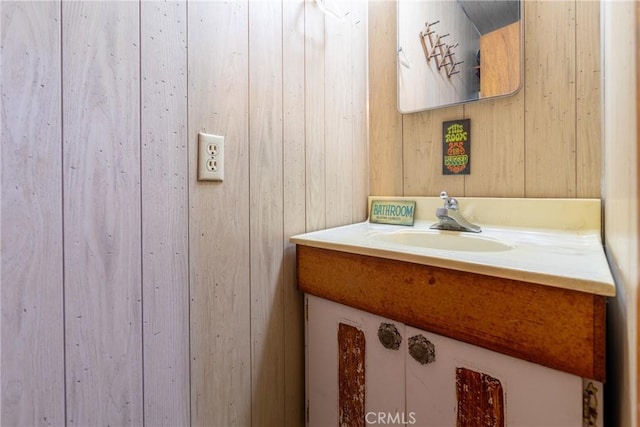 4899 Glenwood Dr, Riverside, CA 92501 - bathroom featuring vanity and wooden walls