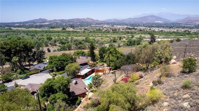 4899 Glenwood Dr, Riverside, CA 92501 - drone / aerial view of a mountain backdrop and a pool