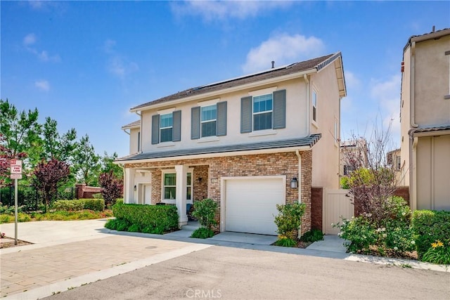 8675 Bay Laurel St, Chino, CA 91708 - traditional-style house with a garage and brick siding