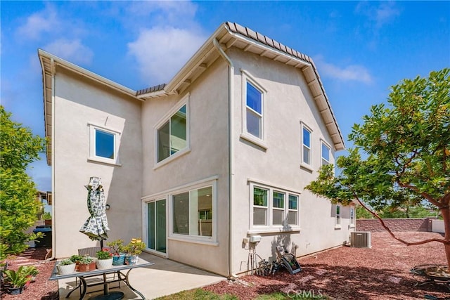 8675 Bay Laurel St, Chino, CA 91708 - rear view of property with a patio area, stucco siding, and central AC