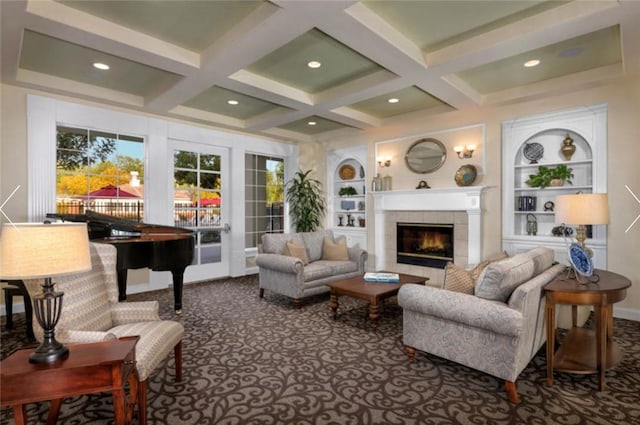 8675 Bay Laurel St, Chino, CA 91708 - living area with a tiled fireplace, coffered ceiling, beam ceiling, built in shelves, and carpet flooring