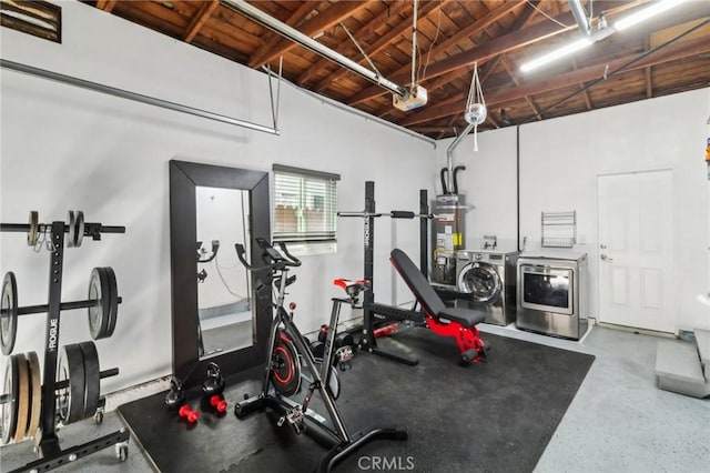 4744 Austin Dr, San Diego, CA 92115 - exercise area featuring washer and dryer, a garage, secured water heater, and wood ceiling