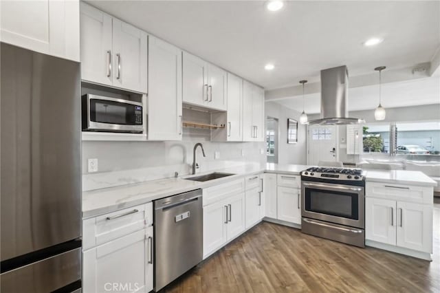 4744 Austin Dr, San Diego, CA 92115 - kitchen with appliances with stainless steel finishes, island exhaust hood, a sink, white cabinets, and recessed lighting