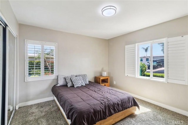 4744 Austin Dr, San Diego, CA 92115 - bedroom with carpet flooring, baseboards, and a closet