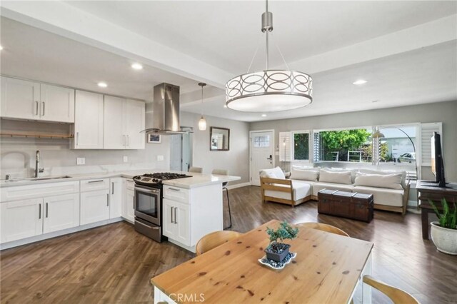 4744 Austin Dr, San Diego, CA 92115 - kitchen with stainless steel gas stove, a sink, island range hood, open floor plan, and light countertops