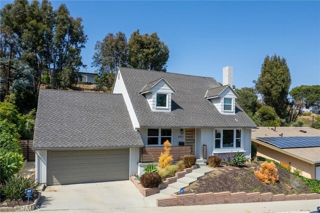 4501 Don Miguel Dr, Los Angeles, CA 90008 - cape cod-style house with a chimney, roof with shingles, and driveway