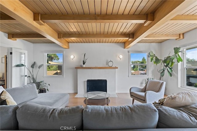 4501 Don Miguel Dr, Los Angeles, CA 90008 - living room featuring wood finished floors, a fireplace with flush hearth, and wood ceiling with exposed beams