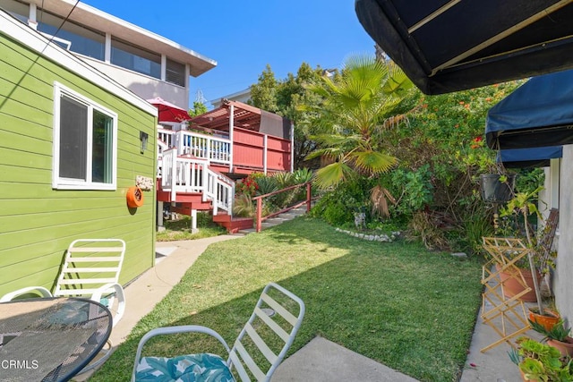 2740 Auburn St, Los Angeles, CA 90039 - view of grassy yard featuring a deck