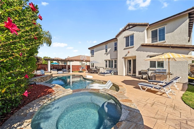 34032 Temecula Creek Rd, Temecula, CA 92592 - view of pool featuring a patio area, a pool with connected hot tub, and an outdoor living space