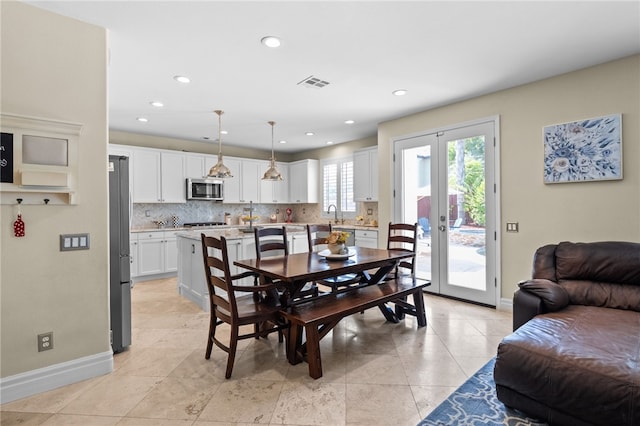34032 Temecula Creek Rd, Temecula, CA 92592 - dining room featuring light tile patterned floors, recessed lighting, and french doors