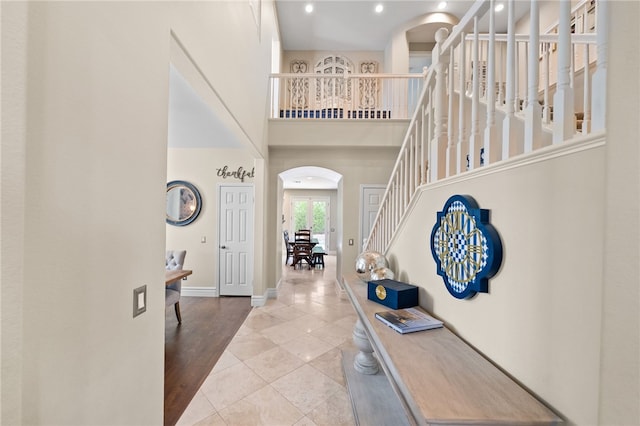 34032 Temecula Creek Rd, Temecula, CA 92592 - tiled entryway with arched walkways, recessed lighting, stairs, and a towering ceiling