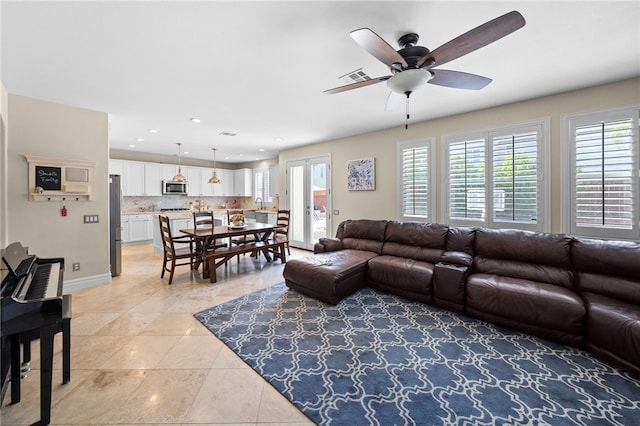 34032 Temecula Creek Rd, Temecula, CA 92592 - living room with a ceiling fan, light tile patterned flooring, and recessed lighting