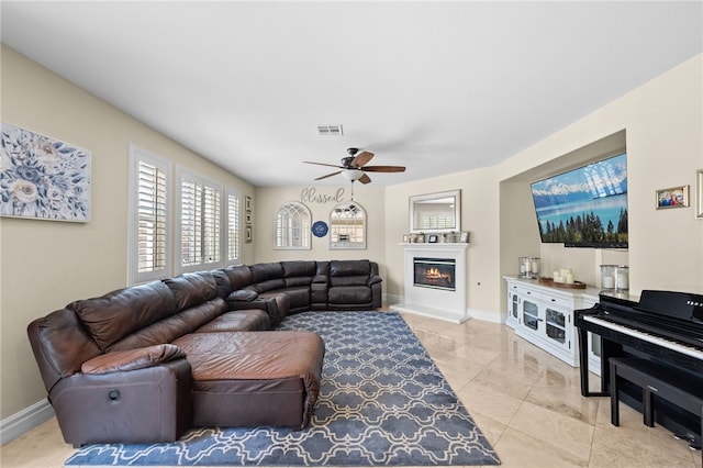 34032 Temecula Creek Rd, Temecula, CA 92592 - living room with a ceiling fan and a glass covered fireplace