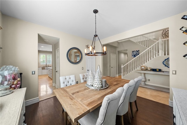 34032 Temecula Creek Rd, Temecula, CA 92592 - dining area with a chandelier, stairs, and dark wood finished floors