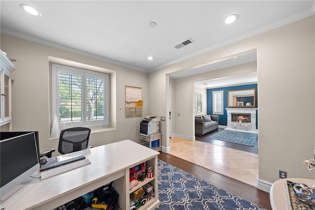 34032 Temecula Creek Rd, Temecula, CA 92592 - home office with dark wood-type flooring, recessed lighting, ornamental molding, and a glass covered fireplace
