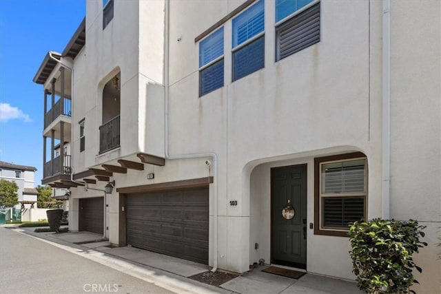1855 Orizaba Unit 103, Signal Hill, CA 90755 - view of building exterior with a garage