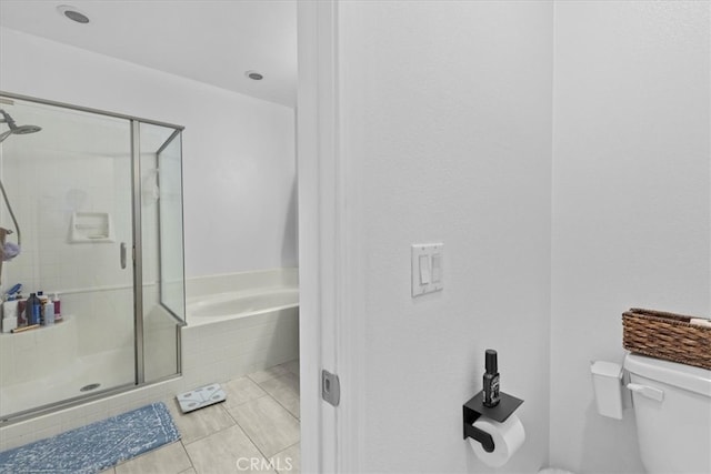 1855 Orizaba Unit 103, Signal Hill, CA 90755 - full bathroom with toilet, a shower stall, a garden tub, and tile patterned floors