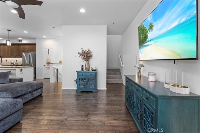 1855 Orizaba Unit 103, Signal Hill, CA 90755 - living room featuring stairway, dark wood finished floors, recessed lighting, ceiling fan, and baseboards