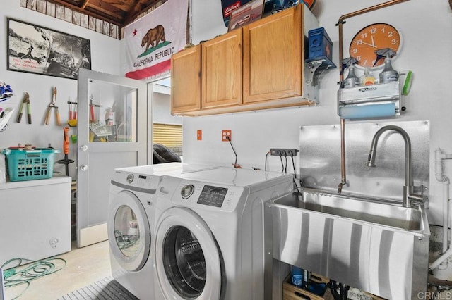 6053 Mohler St, San Diego, CA 92120 - laundry area featuring cabinet space and washer and dryer