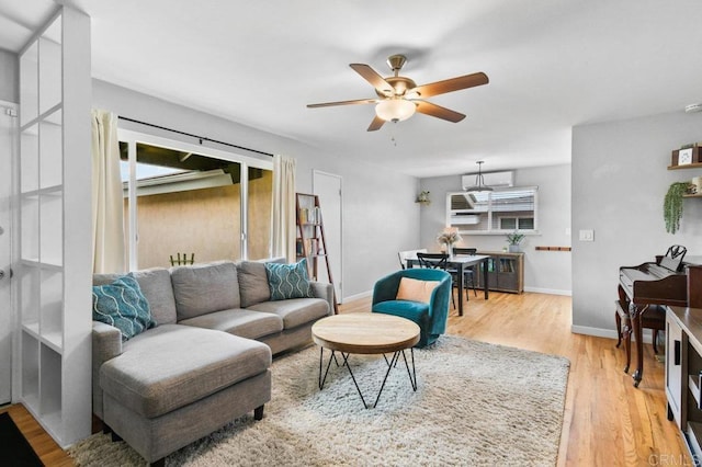 6053 Mohler St, San Diego, CA 92120 - living area featuring ceiling fan, baseboards, and light wood-style flooring