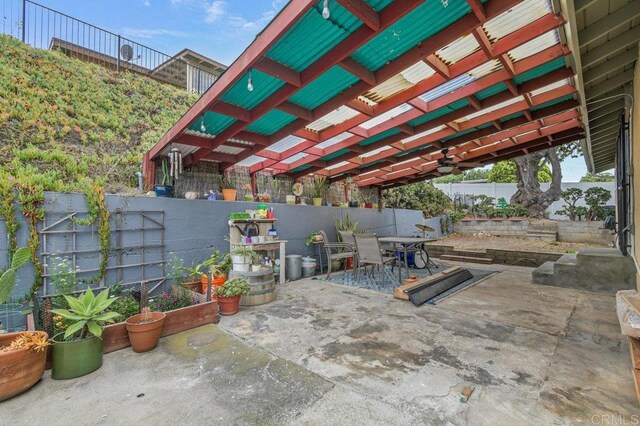 6053 Mohler St, San Diego, CA 92120 - fenced backyard featuring outdoor dining area and a patio area
