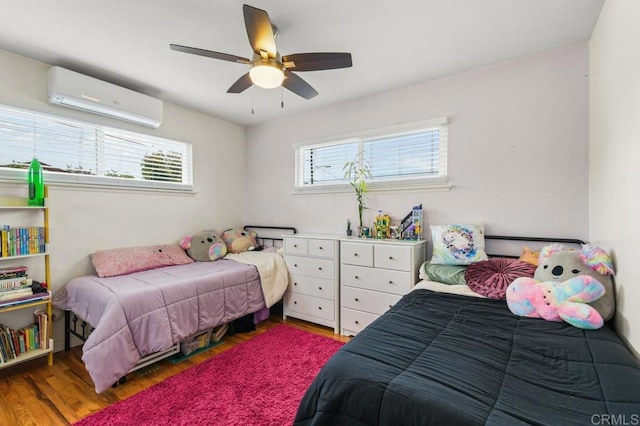 6053 Mohler St, San Diego, CA 92120 - bedroom featuring a wall unit AC, wood finished floors, and ceiling fan