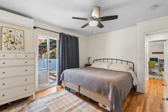 6053 Mohler St, San Diego, CA 92120 - bedroom with access to exterior, light wood-style floors, a wall mounted air conditioner, and a ceiling fan