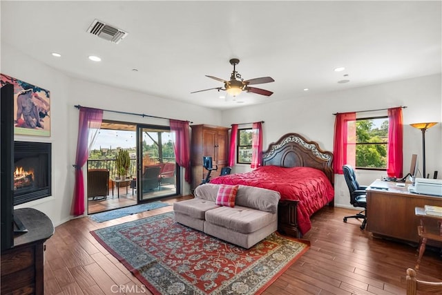 633 Sunnyhill Dr, Los Angeles, CA 90065 - bedroom featuring access to outside, multiple windows, recessed lighting, and wood-type flooring