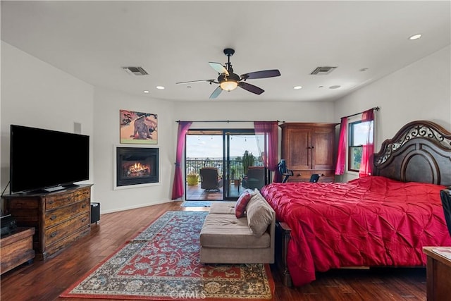 633 Sunnyhill Dr, Los Angeles, CA 90065 - bedroom featuring access to outside, a glass covered fireplace, wood finished floors, recessed lighting, and baseboards