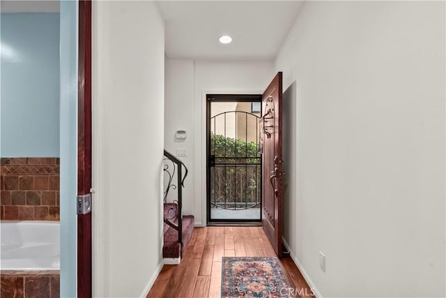 633 Sunnyhill Dr, Los Angeles, CA 90065 - doorway featuring wood finished floors, baseboards, and recessed lighting