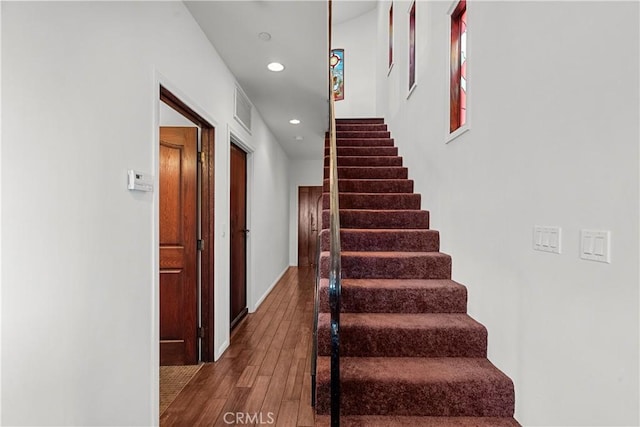 633 Sunnyhill Dr, Los Angeles, CA 90065 - staircase with wood-type flooring, recessed lighting, and baseboards