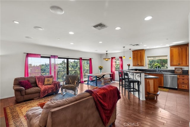 633 Sunnyhill Dr, Los Angeles, CA 90065 - living room featuring wood finished floors, recessed lighting, and baseboards