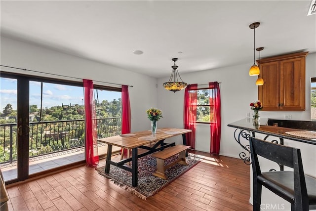 633 Sunnyhill Dr, Los Angeles, CA 90065 - dining space featuring wood finished floors