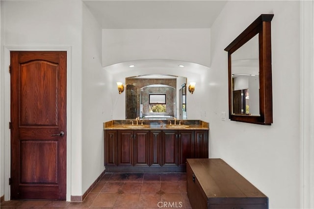 633 Sunnyhill Dr, Los Angeles, CA 90065 - full bath featuring double vanity and tile patterned floors
