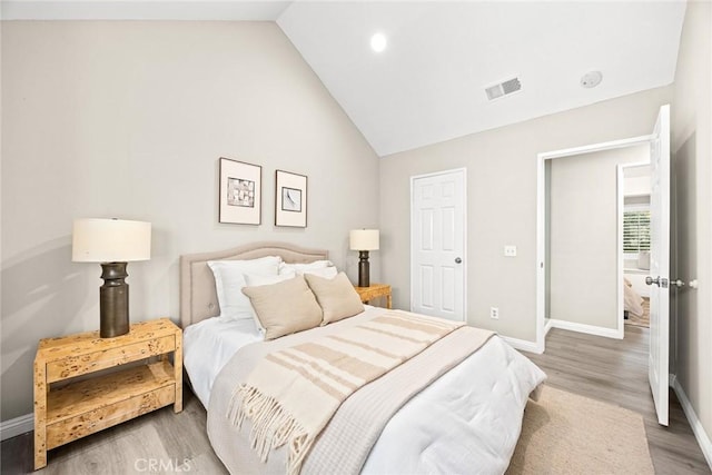 407 E Duarte Rd Unit D, Arcadia, CA 91006 - bedroom featuring baseboards, wood finished floors, and high vaulted ceiling