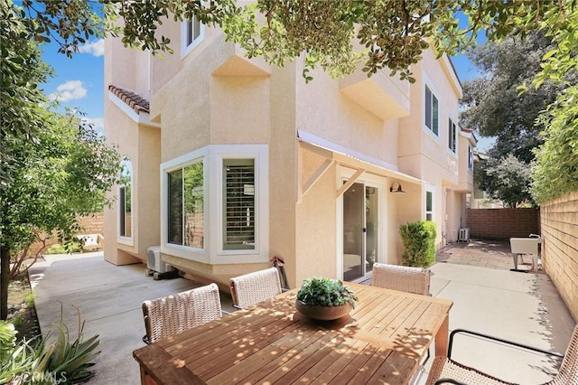 407 E Duarte Rd Unit D, Arcadia, CA 91006 - rear view of property with a patio area, stucco siding, and a fenced backyard