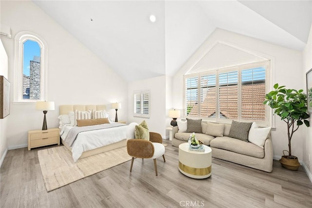 407 E Duarte Rd Unit D, Arcadia, CA 91006 - bedroom with vaulted ceiling, wood finished floors, and baseboards