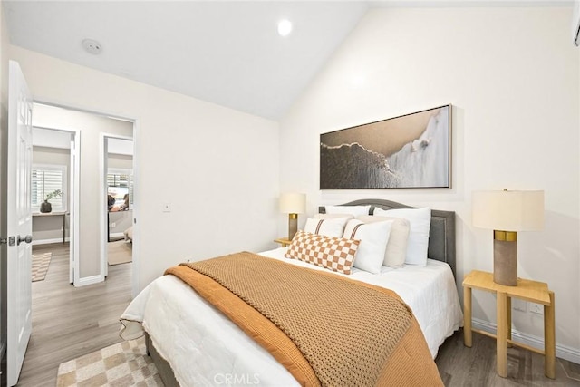 407 E Duarte Rd Unit D, Arcadia, CA 91006 - bedroom featuring vaulted ceiling, light wood finished floors, and recessed lighting