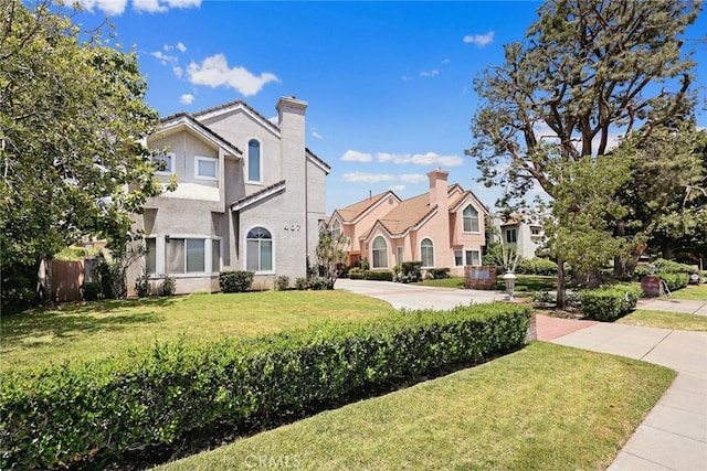 407 E Duarte Rd Unit D, Arcadia, CA 91006 - view of front of property with stucco siding, a chimney, and a residential view