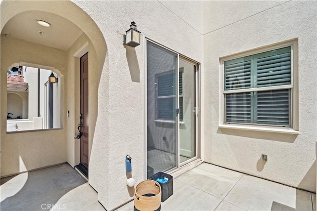 166 Borrego, Irvine, CA 92618 - view of exterior entry featuring stucco siding