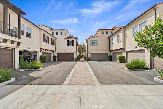 166 Borrego, Irvine, CA 92618 - view of concrete driveway featuring a residential view