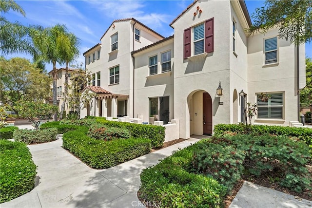 166 Borrego, Irvine, CA 92618 - view of front of home with stucco siding
