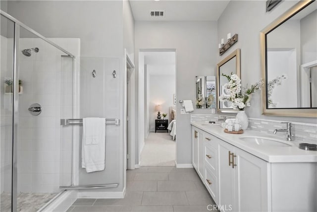 166 Borrego, Irvine, CA 92618 - ensuite bathroom featuring double vanity, a stall shower, and tile patterned floors