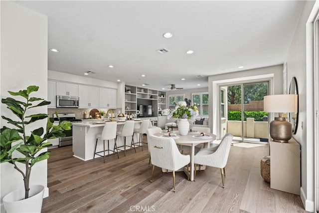 166 Borrego, Irvine, CA 92618 - dining space featuring wood finished floors, recessed lighting, and a ceiling fan