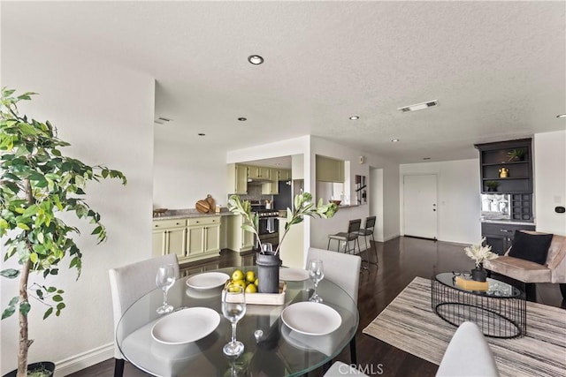 1436 257th St Unit 303, Harbor City, CA 90710 - dining area with dark wood-style floors, baseboards, a textured ceiling, and recessed lighting