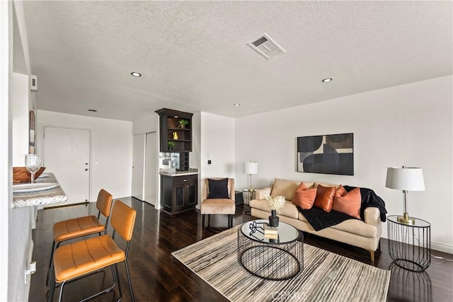 1436 257th St Unit 303, Harbor City, CA 90710 - living room featuring dark wood-style floors, recessed lighting, baseboards, and a textured ceiling