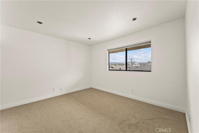 1436 257th St Unit 303, Harbor City, CA 90710 - carpeted empty room with baseboards and recessed lighting