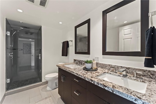 1436 257th St Unit 303, Harbor City, CA 90710 - full bathroom with double vanity, toilet, a stall shower, tile patterned flooring, and recessed lighting