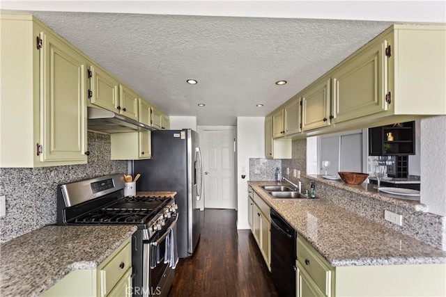 1436 257th St Unit 303, Harbor City, CA 90710 - kitchen with stainless steel range with gas cooktop, under cabinet range hood, a sink, dark wood finished floors, and black dishwasher